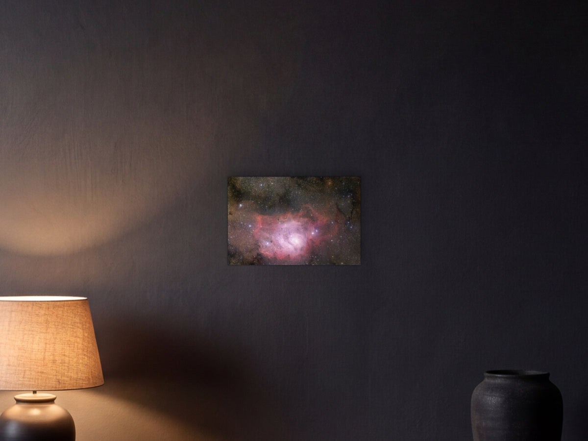 Lagoon Nebula shown in a graphite plaster wall at night, lit by a console lamp - scale render at 45 × 30 cm