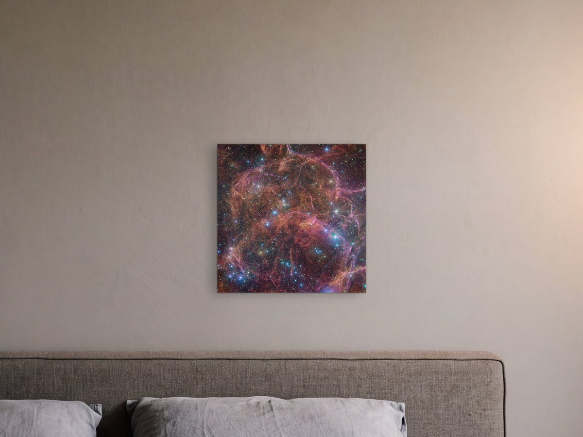 Vela supernova remnant - Metal Print 40 × 40 cm shown in a dark bedroom with a warm plaster wall - scale render at 40 × 40 cm
