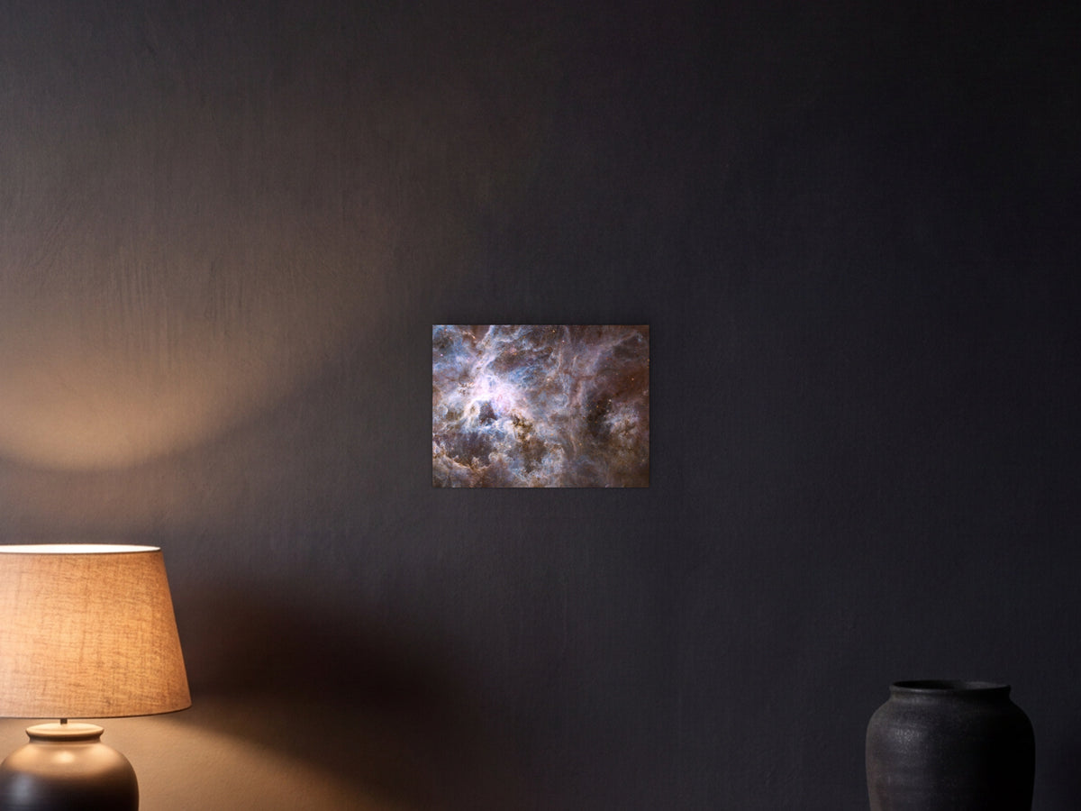 Tarantula Nebula shown in a graphite plaster wall at night, lit by a console lamp - scale render at 40 × 30 cm